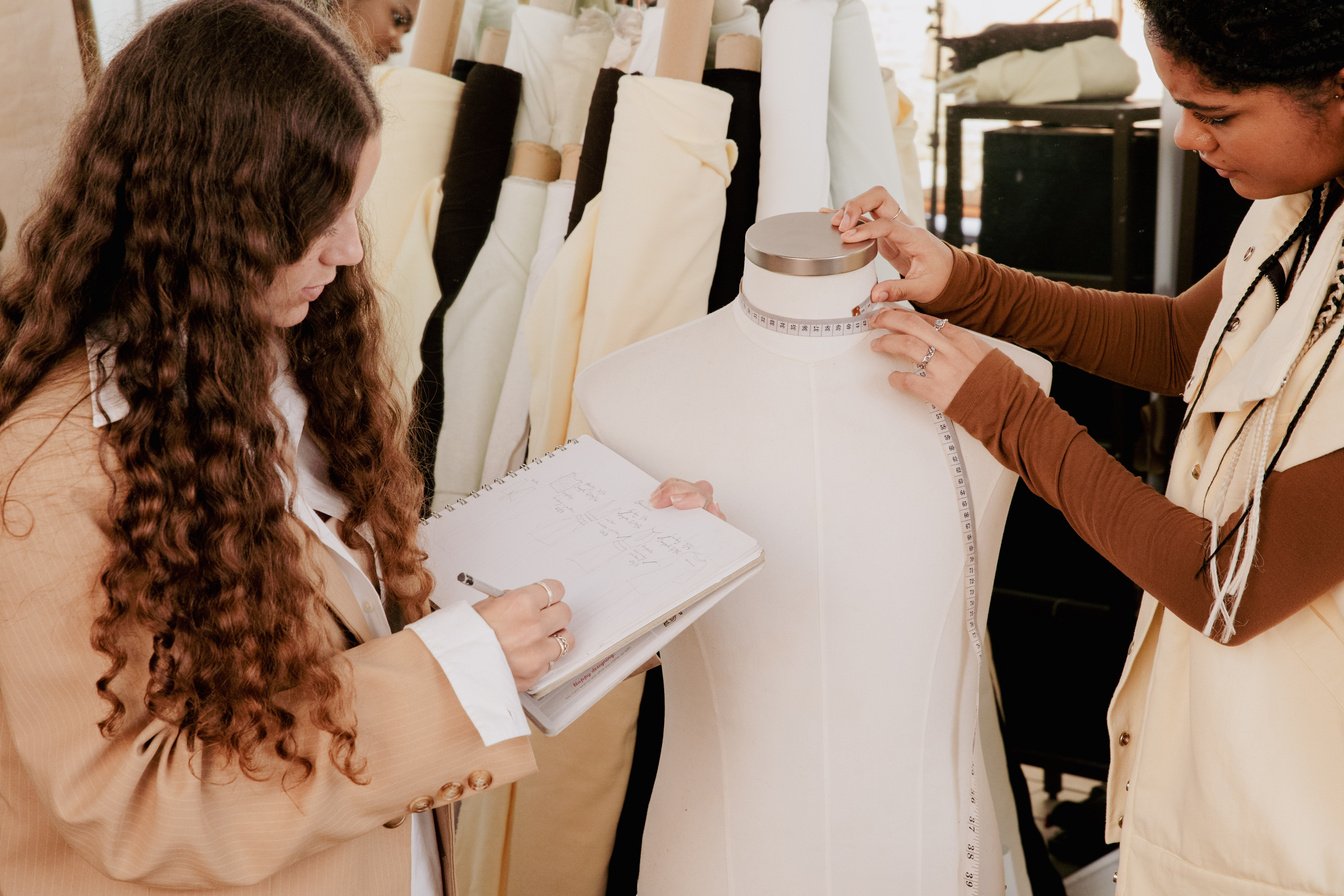 Fashion Designers Taking Measurements