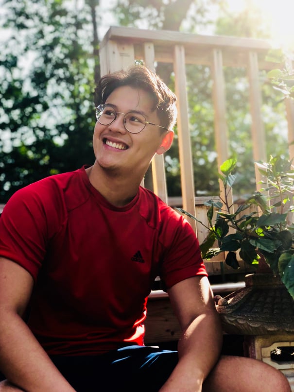 Man Wearing Red Shirt And Eyeglasses