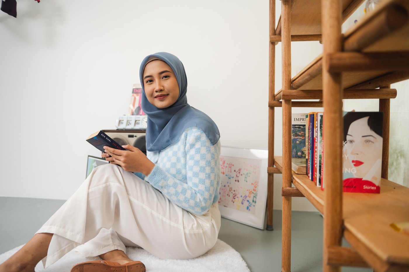 People of Indonesia Young Woman Sitting on Floor Indoors