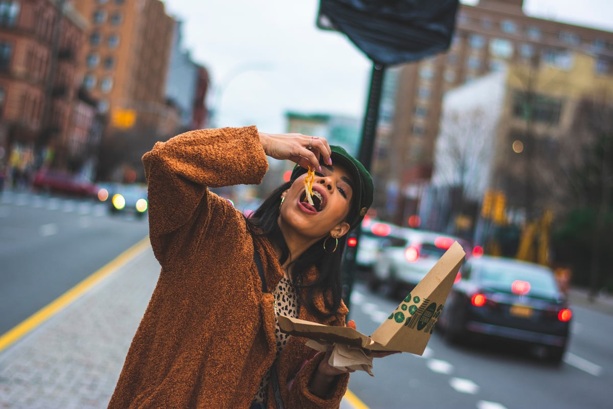 Woman Eating Pizza