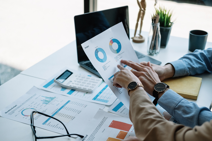 Two accountant discussion analysis sharing calculations abou